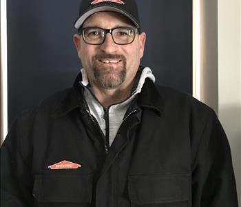 man with dark hair with servpro uniform on