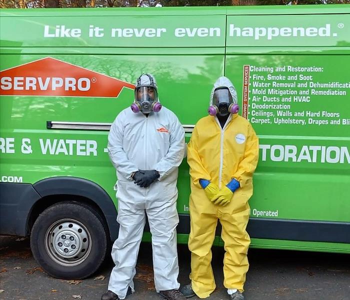 2 Servpro Technicians in protective gear