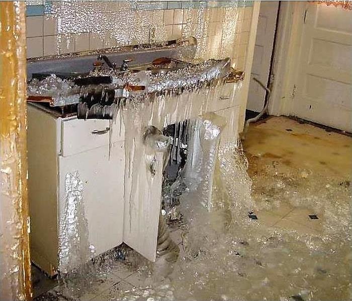 kitchen with ice frozen over everything